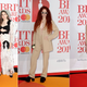 Illustration for article titled Inside the Dramatic Tulle Wars of the Brit Awards Red Carpet